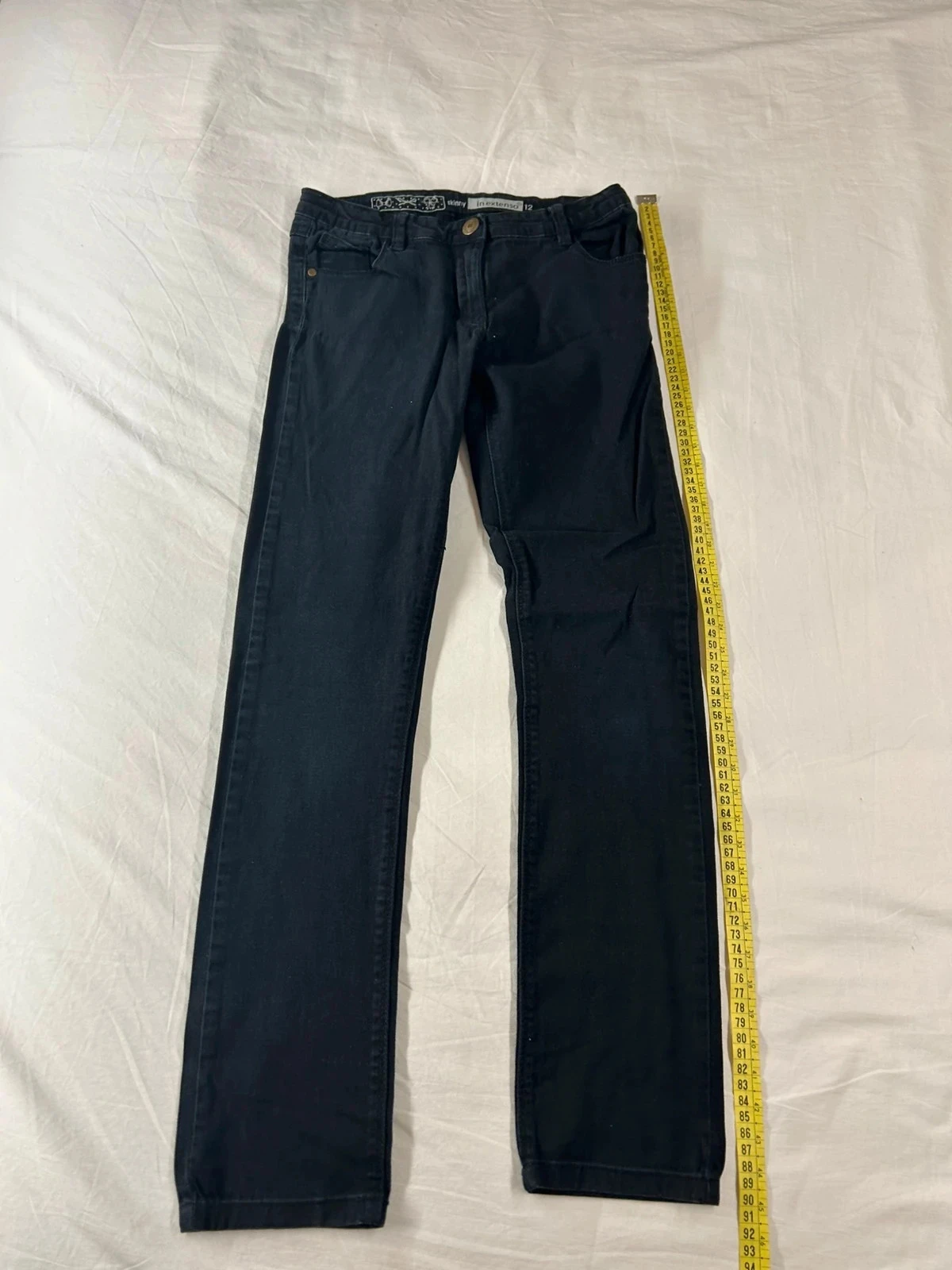 Jean skinny noir in extenso
